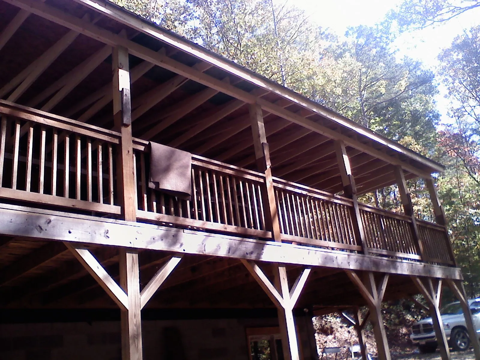 Timber framing under a new elevated porch and deck — Roof Leak Repair in York Springs by Roofing Brothers